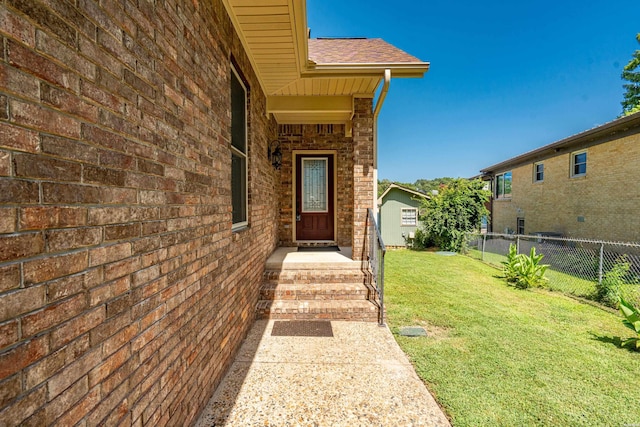220 Mcdonald Loop, Hot Springs, AR 71913 - property entrance featuring a shingled roof and brick siding