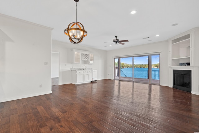 220 Mcdonald Loop, Hot Springs, AR 71913 - unfurnished living room with a chandelier, dark wood-style floors, a fireplace, recessed lighting, and ceiling fan