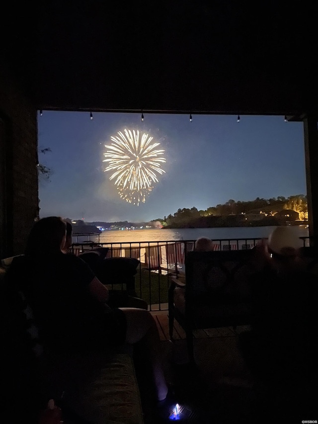 220 Mcdonald Loop, Hot Springs, AR 71913 - patio at twilight with a balcony