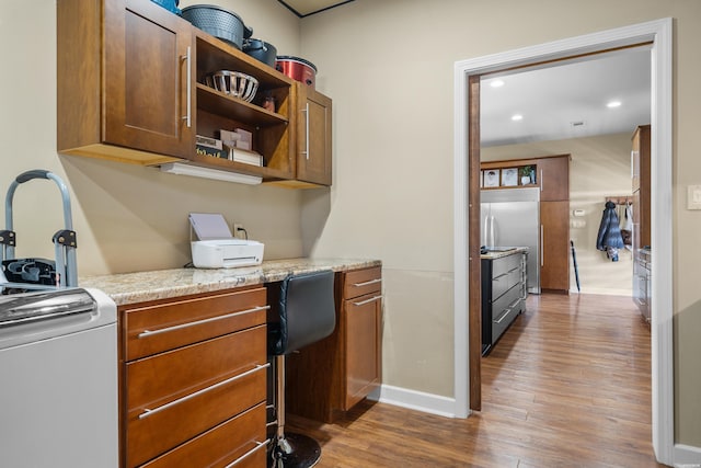 home office featuring recessed lighting, baseboards, and wood finished floors