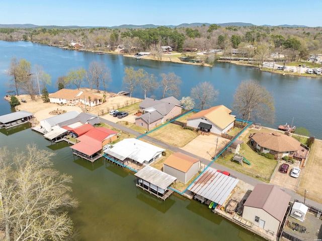 birds eye view of property featuring a residential view and a water view