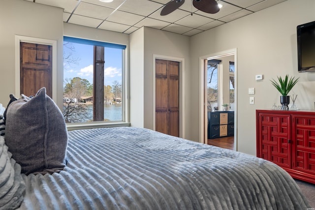 bedroom featuring a paneled ceiling