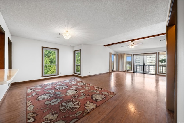724 Weston Rd Unit Q-4, Hot Springs, AR 71913 - unfurnished living room featuring a textured ceiling, wood finished floors, vaulted ceiling, and ceiling fan