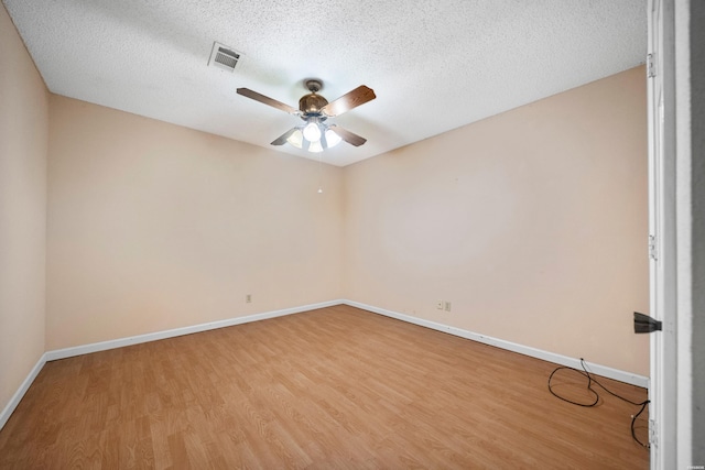 724 Weston Rd Unit Q-4, Hot Springs, AR 71913 - spare room with a ceiling fan, light wood-type flooring, and a textured ceiling