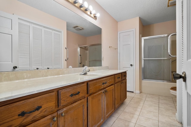 724 Weston Rd Unit Q-4, Hot Springs, AR 71913 - full bathroom with vanity, tile patterned floors, bath / shower combo with glass door, and a textured ceiling