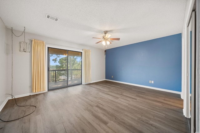 724 Weston Rd Unit Q-4, Hot Springs, AR 71913 - spare room with a ceiling fan, wood finished floors, and a textured ceiling