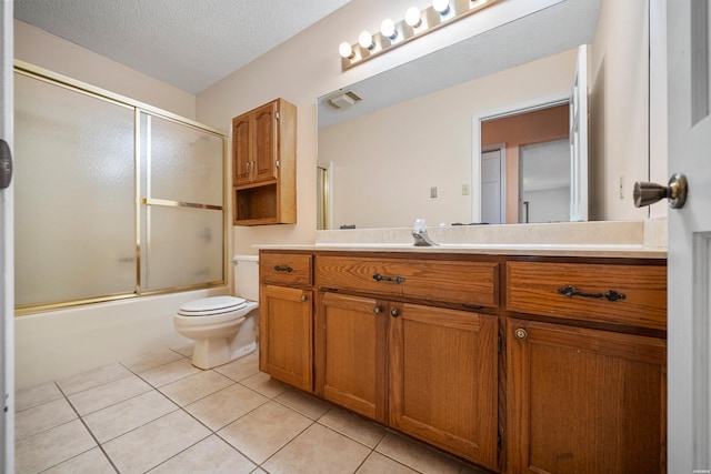 724 Weston Rd Unit Q-4, Hot Springs, AR 71913 - bathroom featuring vanity, tile patterned floors, shower / bath combination with glass door, and a textured ceiling