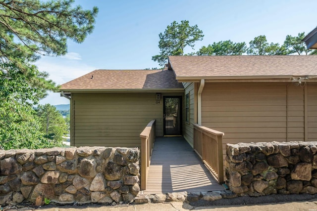 724 Weston Rd Unit Q-4, Hot Springs, AR 71913 - view of exterior entry featuring roof with shingles