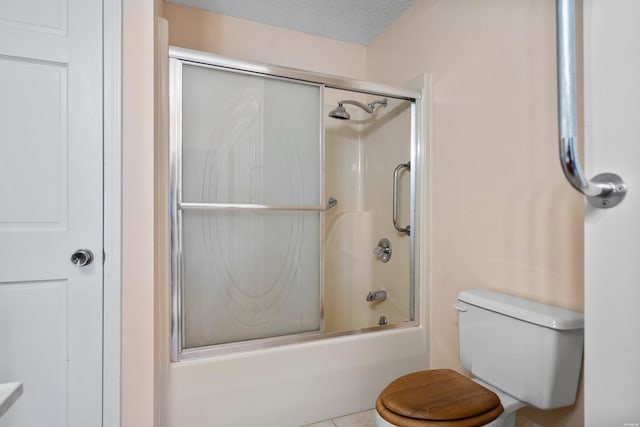 724 Weston Rd Unit Q-4, Hot Springs, AR 71913 - full bath featuring shower / bath combination with glass door and a textured ceiling