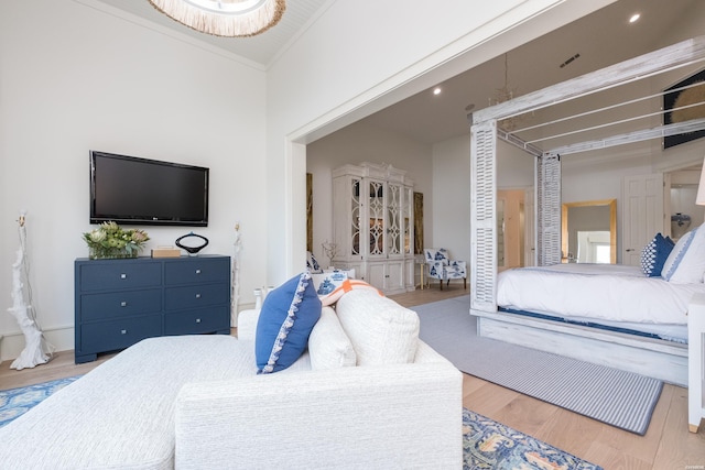 bedroom featuring wood finished floors