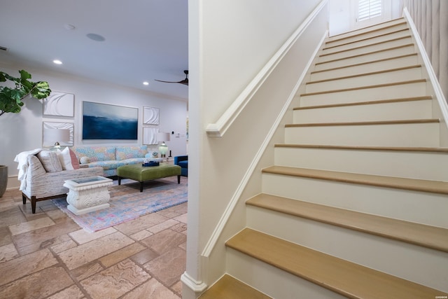 staircase with baseboards, recessed lighting, a ceiling fan, and stone tile flooring