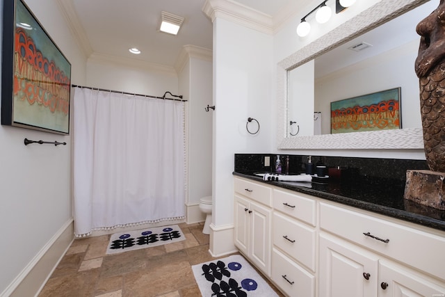 full bath featuring baseboards, toilet, vanity, stone tile floors, and crown molding