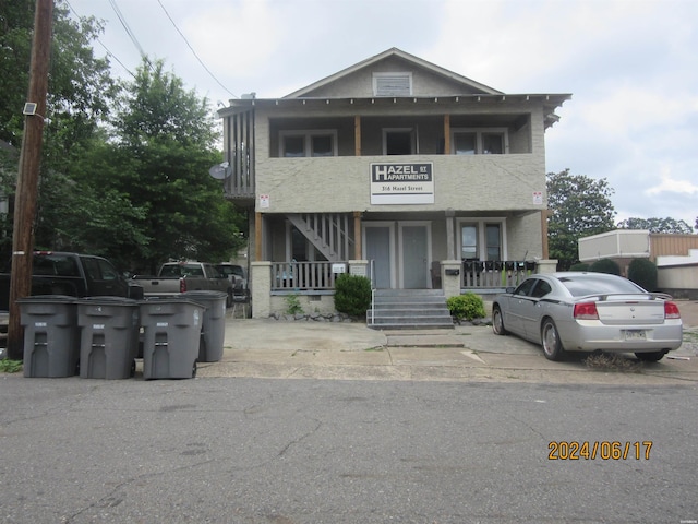 view of front of house featuring stairway