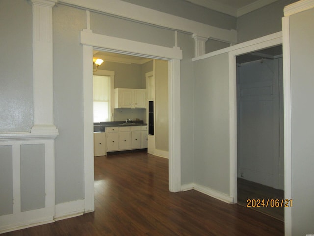 310 Hawthorne St Unit 1, 2, 3, 4, 5, Hot Springs, AR 71901 - hall with baseboards, ornamental molding, dark wood-type flooring, and a sink