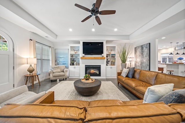 109 Spencer Chase Ct, Hot Springs, AR 71901 - living area featuring a raised ceiling, recessed lighting, a fireplace, a ceiling fan, and built in features