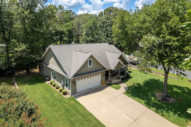 109 Spencer Chase Ct, Hot Springs, AR 71901 - view of front of house with concrete driveway, a front lawn, roof with shingles, and a garage