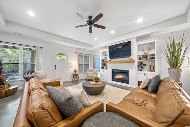 109 Spencer Chase Ct, Hot Springs, AR 71901 - living area with recessed lighting, a fireplace, ceiling fan, built in shelves, and a raised ceiling