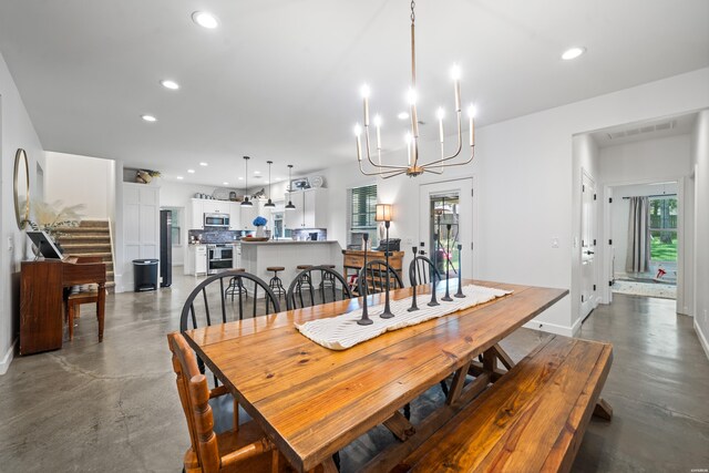 109 Spencer Chase Ct, Hot Springs, AR 71901 - dining space with concrete floors, recessed lighting, and a chandelier