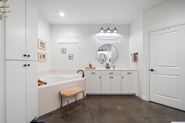 109 Spencer Chase Ct, Hot Springs, AR 71901 - bathroom featuring concrete floors, vanity, a garden tub, and recessed lighting