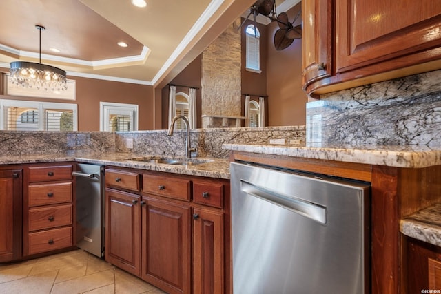 kitchen with light stone countertops, ornamental molding, decorative backsplash, a sink, and dishwasher