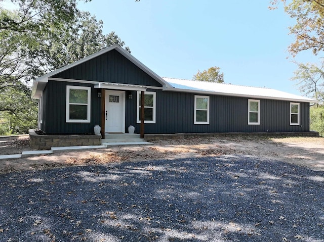 view of front of house featuring metal roof