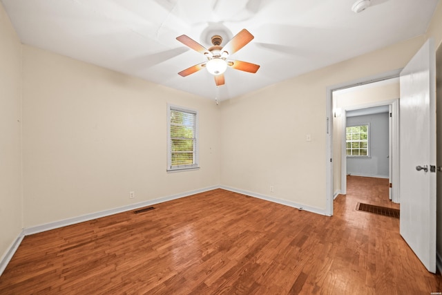 204 First, Hot Springs, AR 71913 - unfurnished room featuring wood finished floors, baseboards, ceiling fan, and a smoke detector