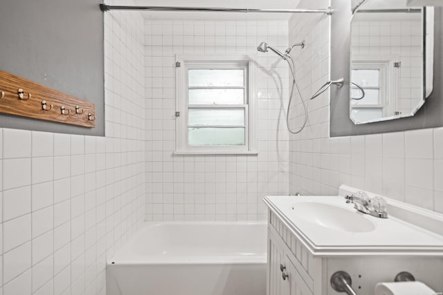 204 First, Hot Springs, AR 71913 - full bathroom with tile walls, healthy amount of natural light, shower / tub combination, and vanity