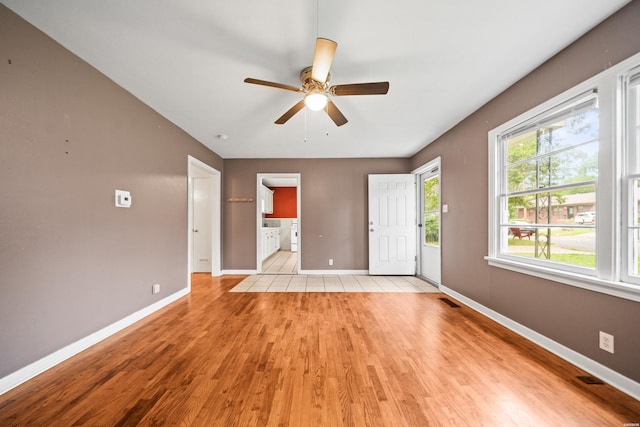204 First, Hot Springs, AR 71913 - empty room with ceiling fan, baseboards, and light wood-type flooring