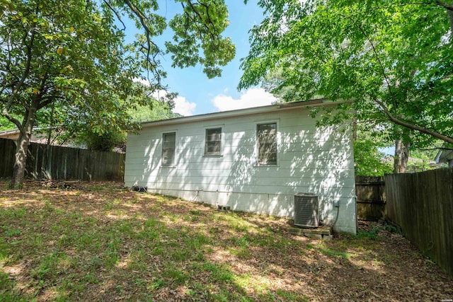 204 First, Hot Springs, AR 71913 - view of side of home featuring crawl space, a fenced backyard, and central air condition unit