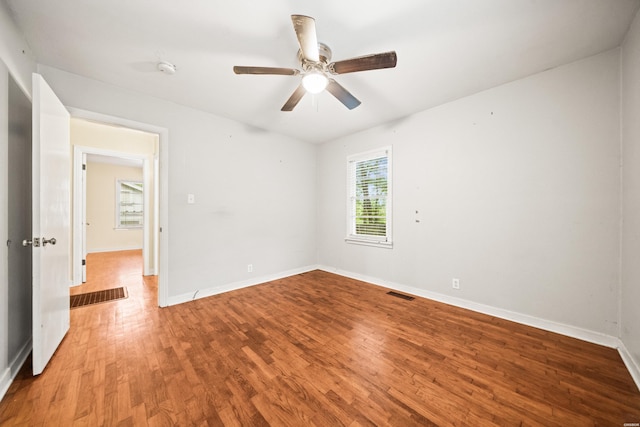 204 First, Hot Springs, AR 71913 - spare room with wood finished floors, ceiling fan, and baseboards