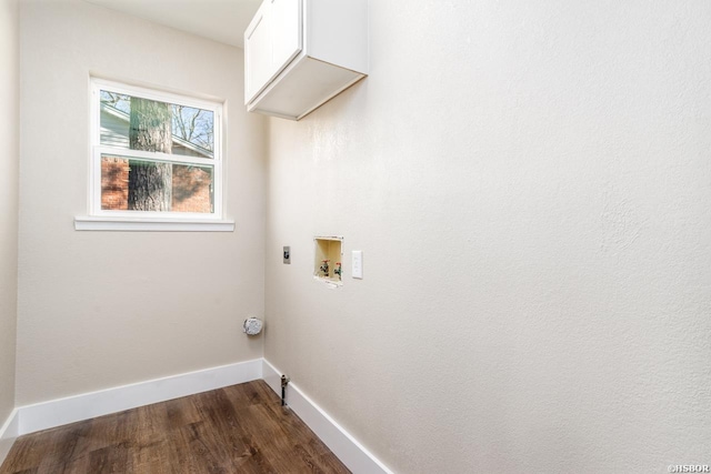 washroom featuring washer hookup, dark wood-style flooring, electric dryer hookup, laundry area, and baseboards