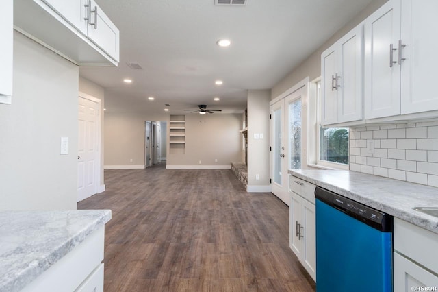 kitchen featuring recessed lighting, white cabinetry, dishwasher, and decorative backsplash