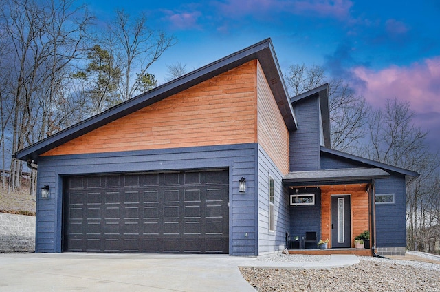 view of front of home with a garage