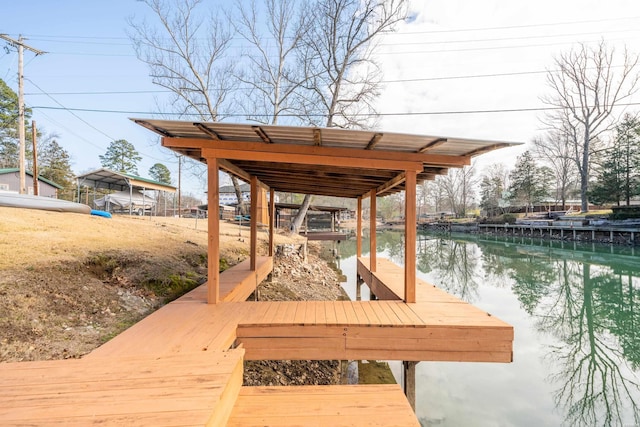 view of dock with a water view