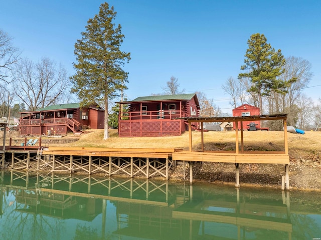 view of dock with a water view