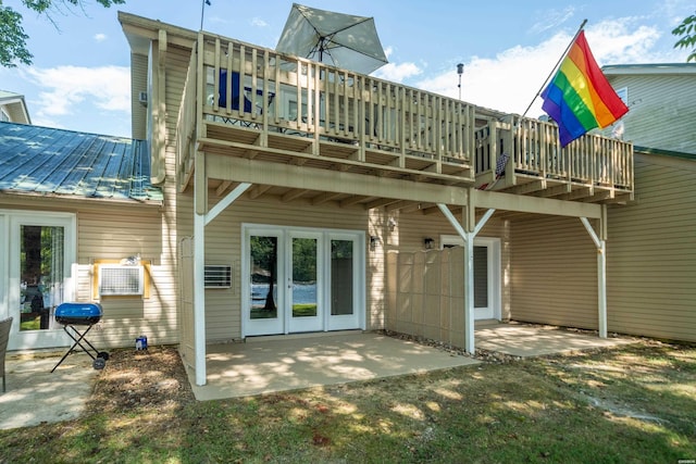 183 River Mill Ct Unit B-2, Hot Springs, AR 71913 - back of property with a patio, a metal roof, and french doors
