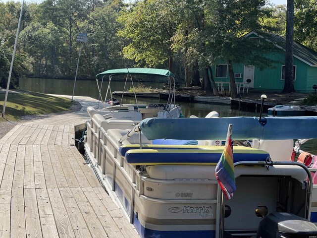 dock area featuring a water view