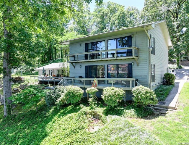 370 Restful Ridge Rd, Hot Springs, AR 71913 - rear view of house with a balcony, a wooden deck, and view of wooded area