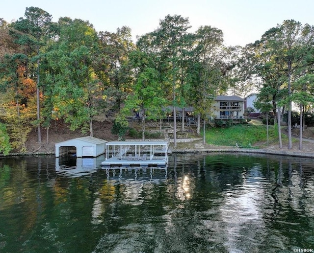 view of dock featuring a water view and boat lift