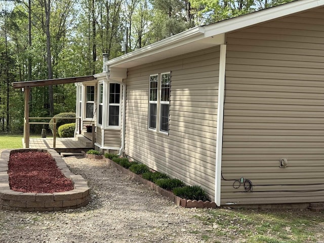 5301 Owensville Cutoff Cutoff, Lonsdale, AR 72087 - view of side of home with a deck
