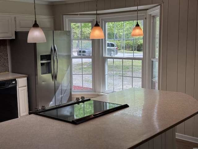 5301 Owensville Cutoff Cutoff, Lonsdale, AR 72087 - kitchen featuring stovetop, dishwasher, stainless steel fridge, and white cabinets
