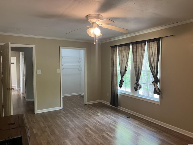 5301 Owensville Cutoff Cutoff, Lonsdale, AR 72087 - spare room with dark wood-style floors, baseboards, and ceiling fan