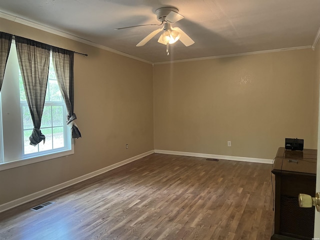 5301 Owensville Cutoff Cutoff, Lonsdale, AR 72087 - spare room featuring visible vents, ceiling fan, plenty of natural light, and dark wood-style floors