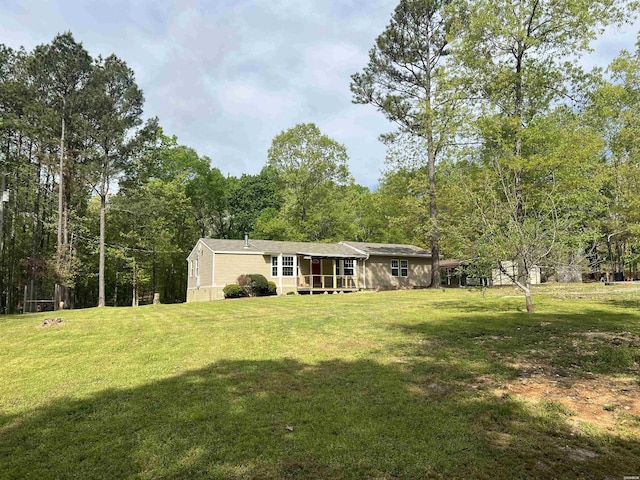 5301 Owensville Cutoff Cutoff, Lonsdale, AR 72087 - exterior space with a wooded view and a yard
