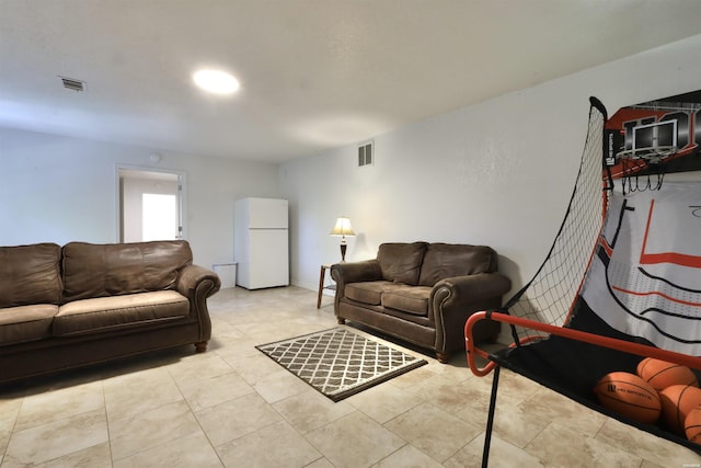 tiled living room with visible vents