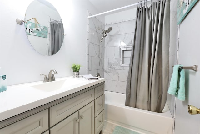 bathroom with shower / tub combo with curtain and vanity