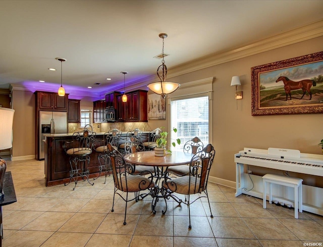 503 Lakeland Dr Unit E6, Hot Springs, AR 71913 - dining space featuring plenty of natural light, ornamental molding, and light tile patterned floors
