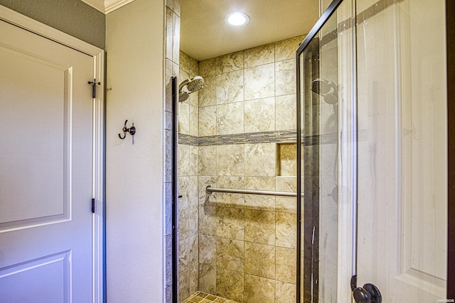 full bath featuring a shower stall