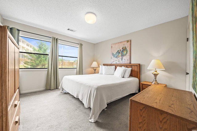 5371 Central Ave Unit 5G, Hot Springs, AR 71913 - carpeted bedroom with a textured ceiling