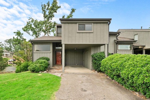 105 Long Island Bay Unit A1, Hot Springs, AR 71913 - view of front of property featuring driveway and a front lawn